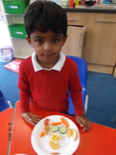 Making fruit faces during Healthy Schools week