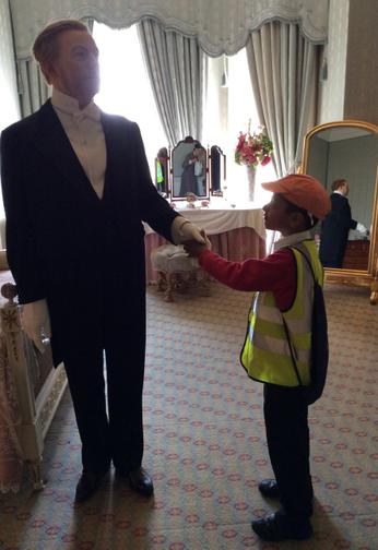 Shaking hands with the waxworks